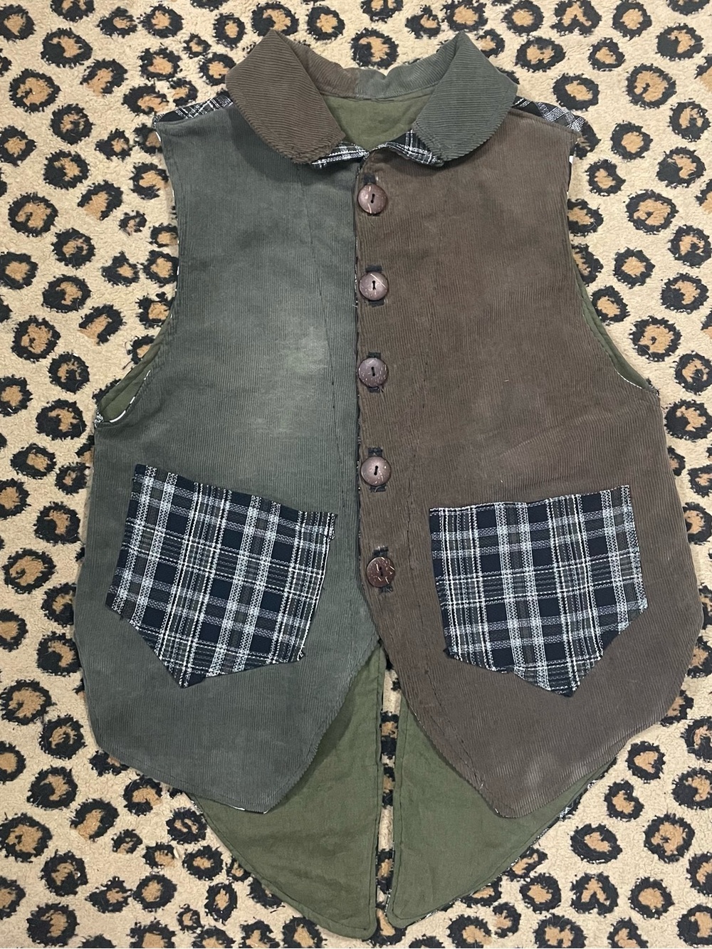 Green and brown vest